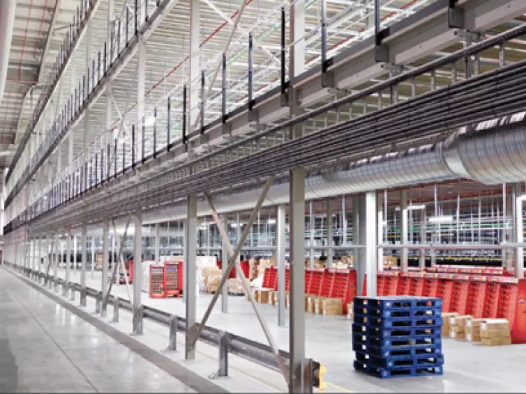 Clothes hanging conveyor system.
