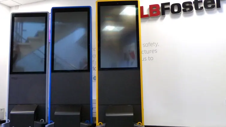 3 Inform totems next to LB Foster wall sign.