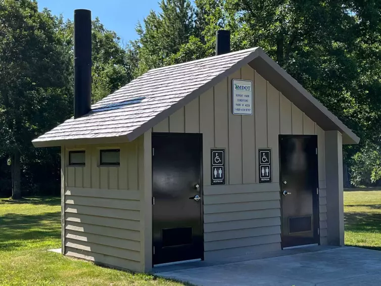 CXT Double Cascadian vault restroom.