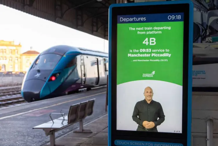 Inform digital totem showing bsl departures for TPE to Manchester.