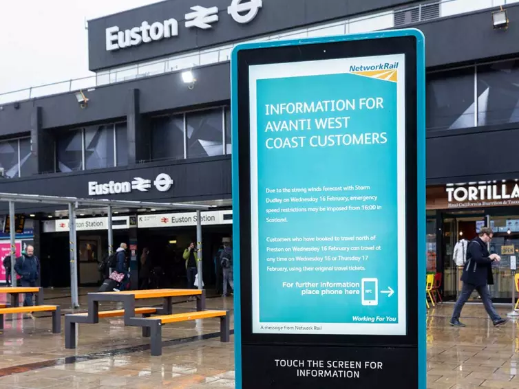 LB Foster information totem outside Euston train station.