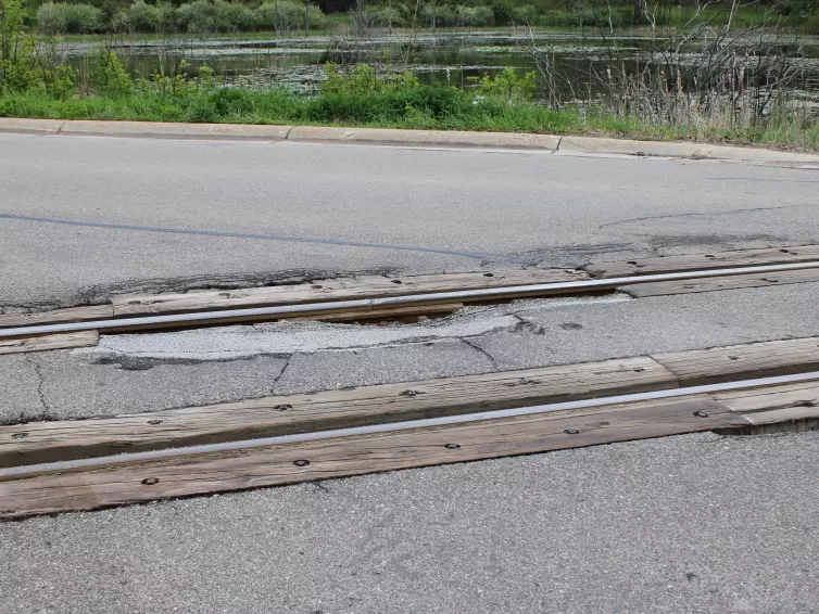 damaged welds and joints in a rail crossing.