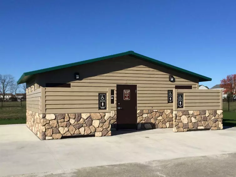 CXT Montrose flush restroom with privacy screen.