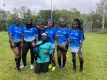 seven girls wearing blue L.B. Foster branded jerseys