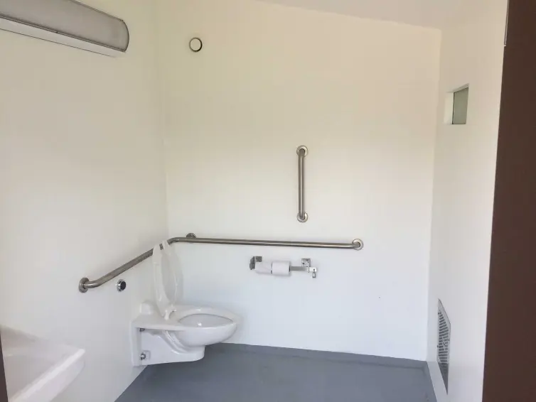 CXT Cortez single-user flush restroom interior.