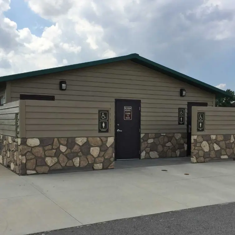 CXT Montrose multiuser flush restroom with privacy screen.
