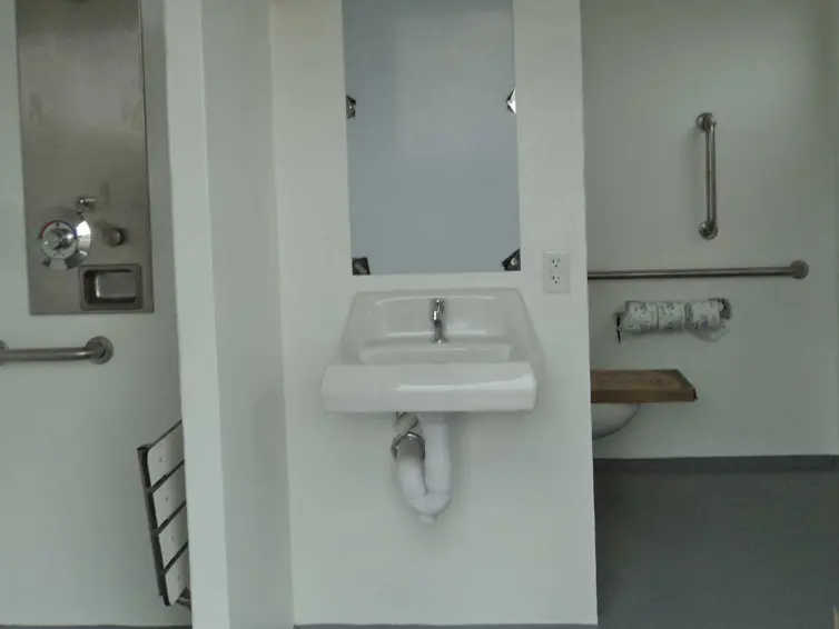 Pioneer restroom with shower interior.