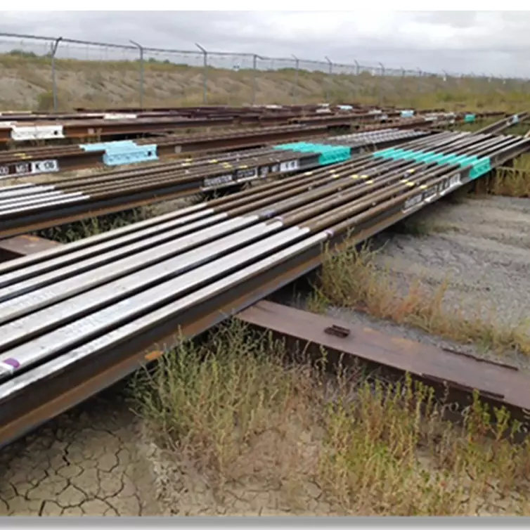 a pile of transition bonded rail.