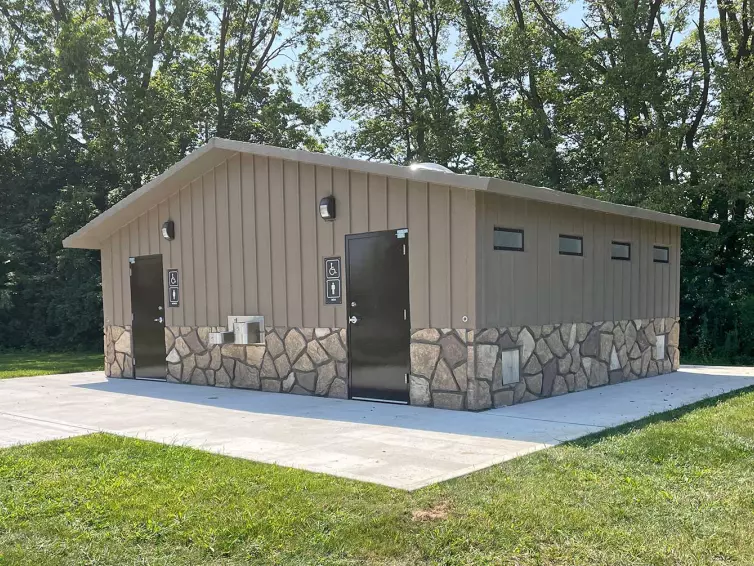 CXT Taos multiuser flush restroom.