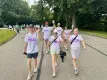 Family walking and waving. Back row (L-R) Bill Thalman, Executive VP & COO, Mark, and Bella. Front row (L-R) Alex, Diane, Heather, and Jack the family dog.