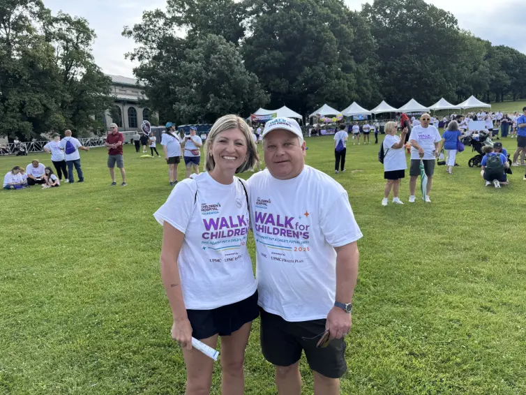 Woman and a man smiling. Sara Rolli, SVP, Operational Admin and John Kasel, President & CEO.
