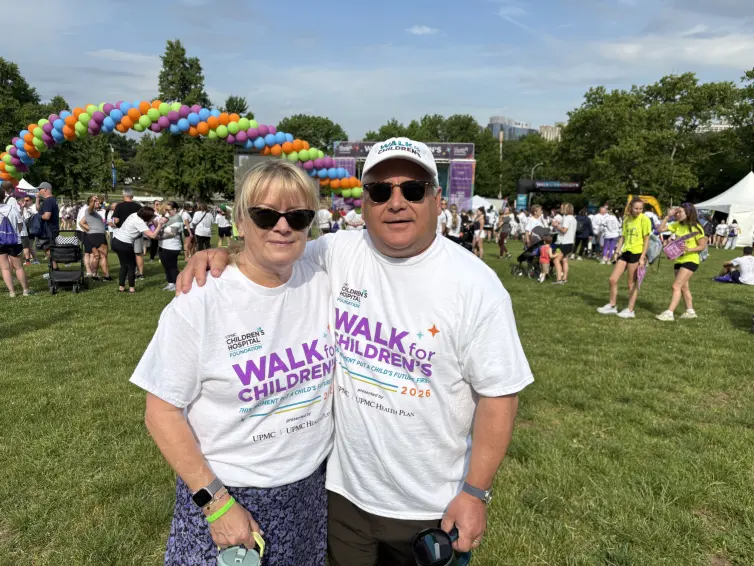 Woman and a man smiling. Katie Kasel and John Kasel, President & CEO.