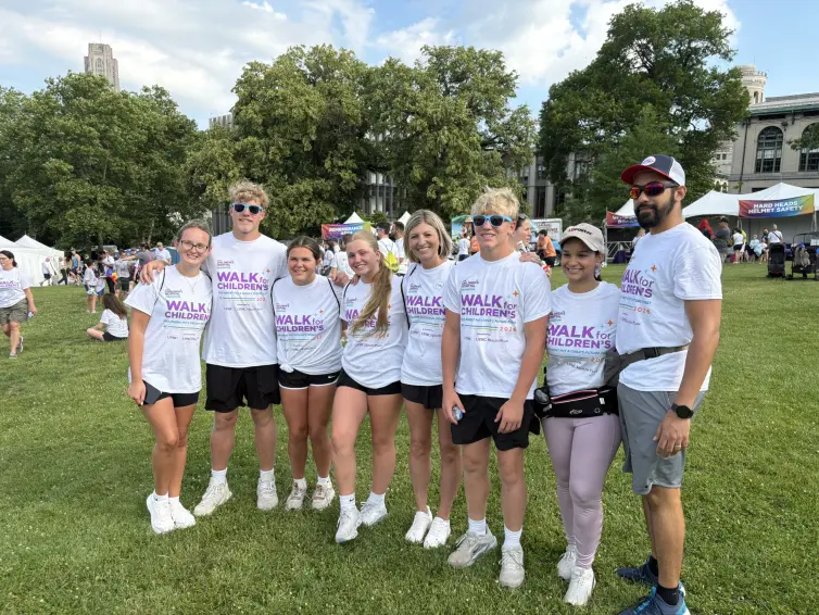 Family smiling. Ellery Phanco, Collin Rolli, Pheobe Phanco, Claire Rolli, Sara Rolli, SVP, Operational Admin, Zachary Rolli, Maria Morla, CI Manager, and Miguel Medina.