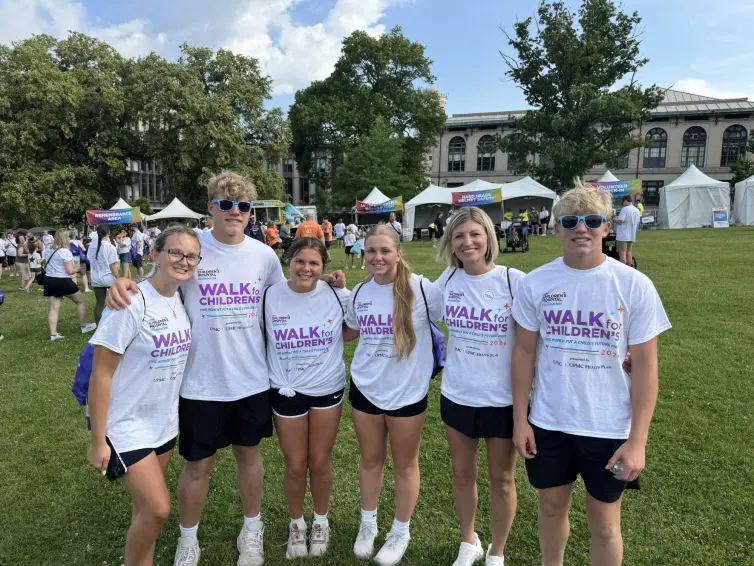 Family smiling. Ellery Phanco, Collin Rolli, Pheobe Phanco, Claire Rolli, Sara Rolli, SVP, Operational Admin, and Zachary Rolli.